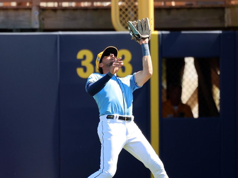 Feb 27, 2024; Port Charlotte, Florida, USA; Tampa Bay Rays right fielder Josh Lowe (15) catches a fly ball during the first inning against the New York Yankees  at Charlotte Sports Park. Mandatory Credit: Kim Klement Neitzel-USA TODAY Sports