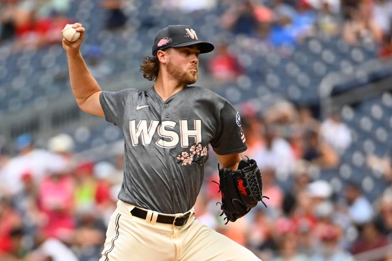 Jul 8, 2023; Washington, District of Columbia, USA; Washington Nationals starting pitcher Jake Irvin (74) throws to the Texas Rangers during the second inning at Nationals Park. Mandatory Credit: Brad Mills-USA TODAY Sports