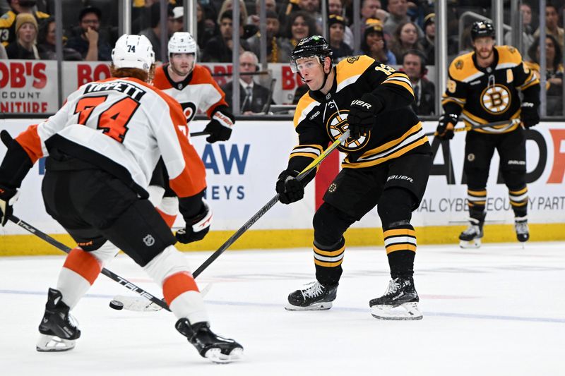 Oct 1, 2024; Boston, Massachusetts, USA; Boston Bruins center Charlie Coyle (13) scores an empty net goal against the Philadelphia Flyers during the third period at the TD Garden. Mandatory Credit: Brian Fluharty-Imagn Images