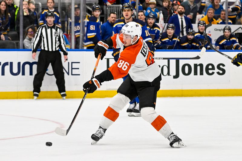 Jan 15, 2024; St. Louis, Missouri, USA;  Philadelphia Flyers left wing Joel Farabee (86) shoots and scores an empty net goal against the St. Louis Blues during the third period at Enterprise Center. Mandatory Credit: Jeff Curry-USA TODAY Sports