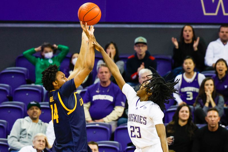 Jan 14, 2023; Seattle, Washington, USA; California Golden Bears forward Grant Newell (14) shoots against Washington Huskies guard Keyon Menifield (23) during the second half at Alaska Airlines Arena at Hec Edmundson Pavilion. Mandatory Credit: Joe Nicholson-USA TODAY Sports