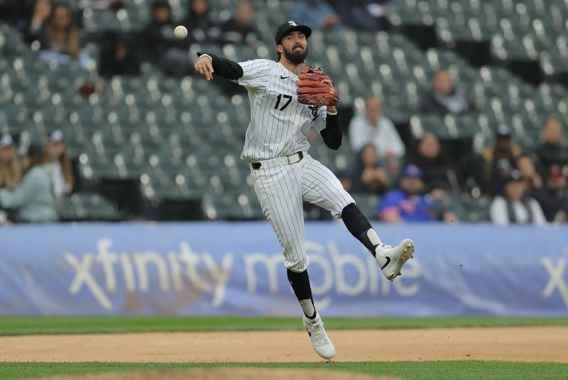 Apr 17, 2024; Chicago, Illinois, USA; Chicago White Sox shortstop Braden Shewmake (17) throws the ball to first base where Kansas City Royals shortstop Bobby Witt Jr. (not pictured) is called in the eighth inning during game one of a double header against the Kansas City Royals at Guaranteed Rate Field. Mandatory Credit: Melissa Tamez-USA TODAY Sports