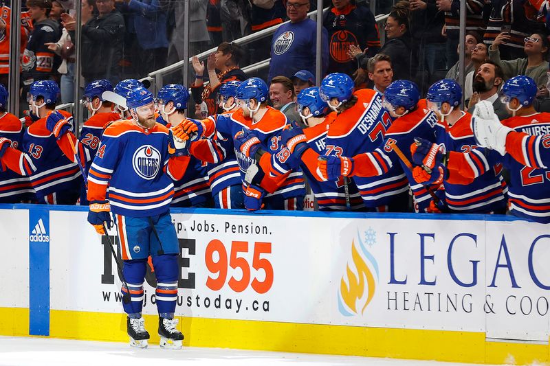 Apr 10, 2024; Edmonton, Alberta, CAN; The Edmonton Oilers celebrate a goal scored by defensemen Mattias Ekholm (14) during the second period against the Vegas Golden Knights at Rogers Place. Mandatory Credit: Perry Nelson-USA TODAY Sports