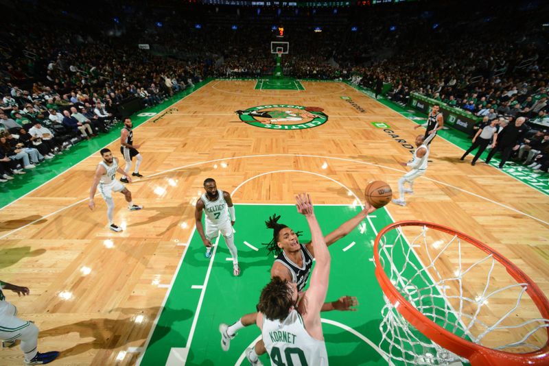 BOSTON, MA - JANUARY 17: Devin Vassell #24 of the San Antonio Spurs shoots the ball during the game against the Boston Celtics on January 17, 2024 at the TD Garden in Boston, Massachusetts. NOTE TO USER: User expressly acknowledges and agrees that, by downloading and or using this photograph, User is consenting to the terms and conditions of the Getty Images License Agreement. Mandatory Copyright Notice: Copyright 2024 NBAE  (Photo by Brian Babineau/NBAE via Getty Images)