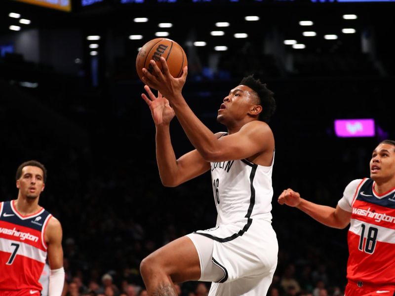 BROOKLYN, NY - OCTOBER 14: Jaylen Martin #16 of the Brooklyn Nets drives to the basket during the game against the Washington Wizards during a NBA preseason game on October 14, 2024 at Barclays Center in Brooklyn, New York. NOTE TO USER: User expressly acknowledges and agrees that, by downloading and or using this Photograph, user is consenting to the terms and conditions of the Getty Images License Agreement. Mandatory Copyright Notice: Copyright 2024 NBAE (Photo by David L. Nemec/NBAE via Getty Images)