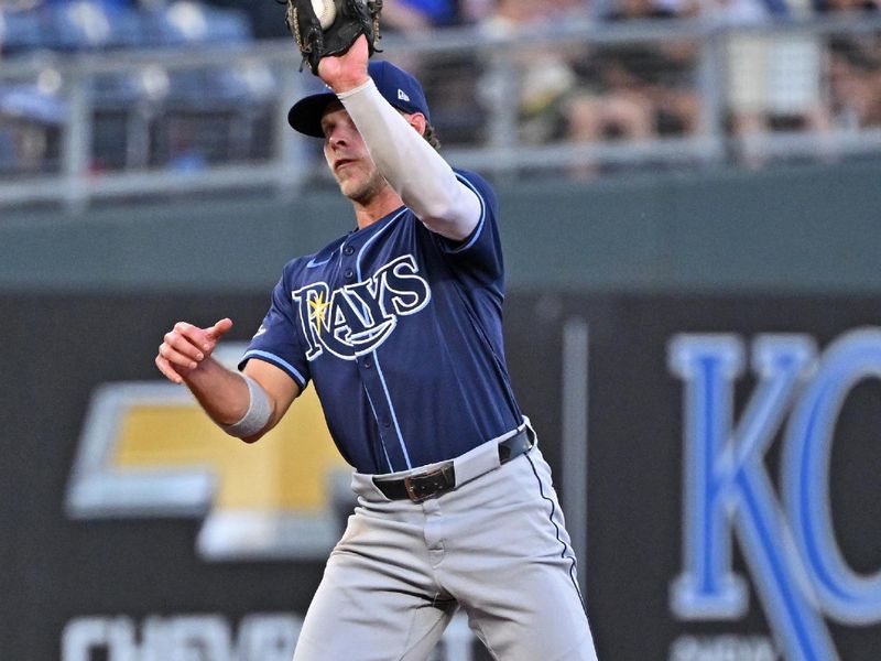 Jun 24, 2025; Kansas City, Missouri, USA;  Tampa Bay Rays shortstop Taylor Walls (6) catches a line drive in the fourth inning against the Kansas City Royals at Kauffman Stadium. Mandatory Credit: Peter Aiken-Imagn Images