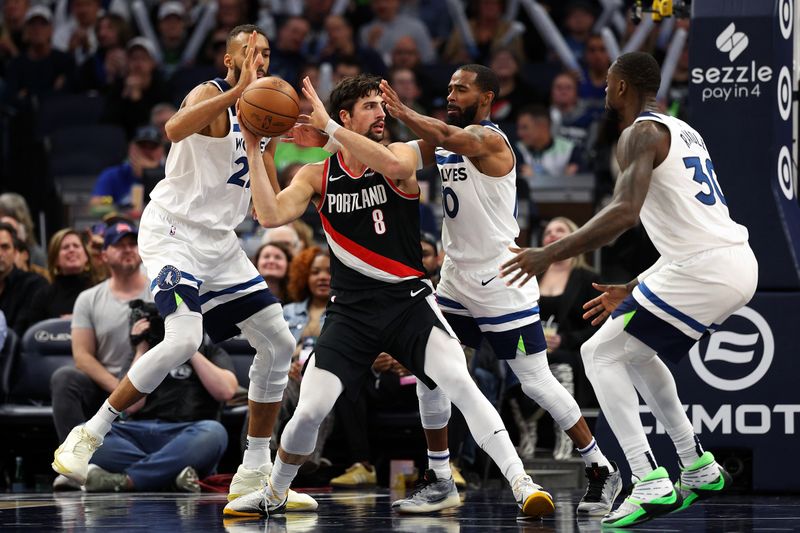 MINNEAPOLIS, MINNESOTA - NOVEMBER 08: Deni Avdija #8 of the Portland Trail Blazers looks to pass against the Minnesota Timberwolves in the third quarter at Target Center on November 08, 2024 in Minneapolis, Minnesota. The Timberwolves defeated the Trail Blazers 127-102 NOTE TO USER: User expressly acknowledges and agrees that, by downloading and or using this photograph, User is consenting to the terms and conditions of the Getty Images License Agreement. (Photo by David Berding/Getty Images)