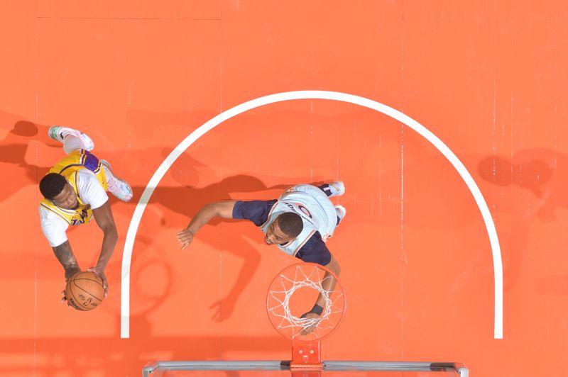 SAN ANTONIO, TX - NOVEMBER 27: Cam Reddish #5 of the Los Angeles Lakers drives to the basket during the game against the San Antonio Spurs on November 27, 2024 at the Frost Bank Center in San Antonio, Texas. NOTE TO USER: User expressly acknowledges and agrees that, by downloading and or using this photograph, user is consenting to the terms and conditions of the Getty Images License Agreement. Mandatory Copyright Notice: Copyright 2024 NBAE (Photos by Michael Gonzales/NBAE via Getty Images)