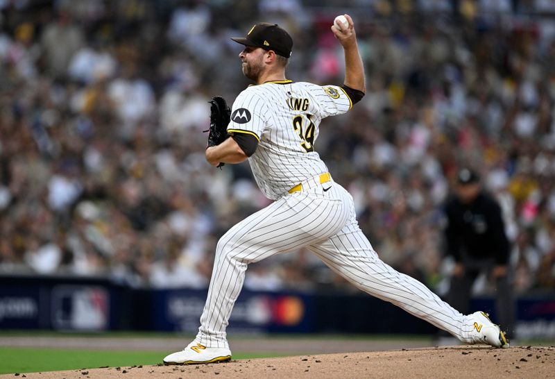 Oct 8, 2024; San Diego, California, USA; San Diego Padres pitcher Michael King (34) throws in the second inning against the Los Angeles Dodgers during game three of the NLDS for the 2024 MLB Playoffs at Petco Park.  Mandatory Credit: Denis Poroy-Imagn Images