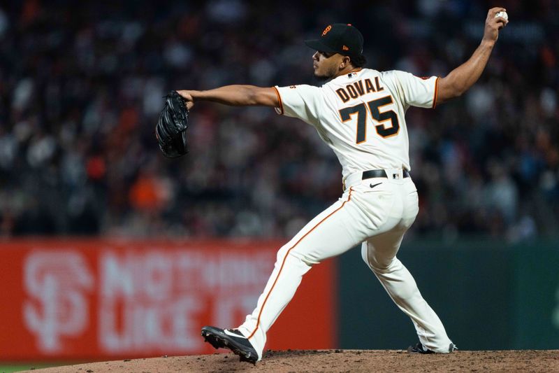 Jul 3, 2023; San Francisco, California, USA;  San Francisco Giants relief pitcher Camilo Doval (75) pitches during the ninth inning against the Seattle Mariners at Oracle Park. Mandatory Credit: Stan Szeto-USA TODAY Sports