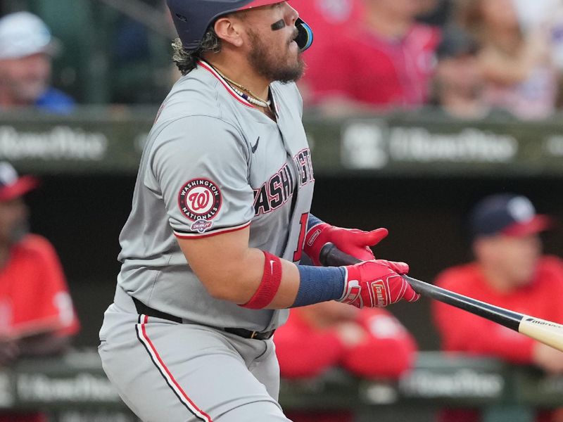 Aug 13, 2024; Baltimore, Maryland, USA; Washington Nationals first baseman Andres Chaparro (19) doubles in the fourth inning for his first major league hit against the Baltimore Orioles at Oriole Park at Camden Yards. Mandatory Credit: Mitch Stringer-USA TODAY Sports