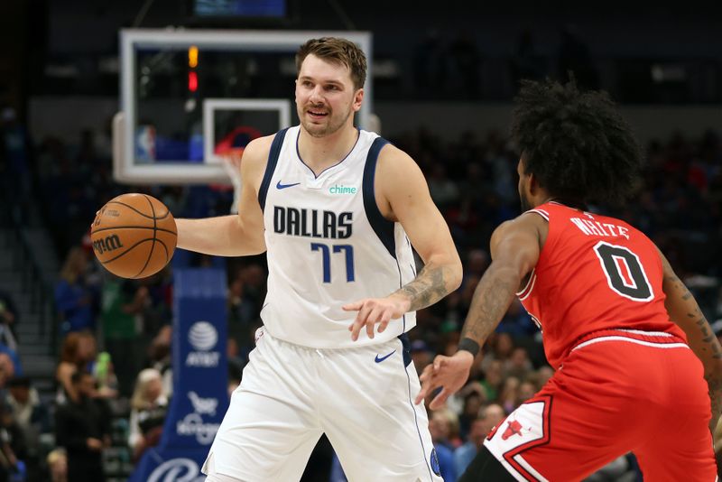 DALLAS, TEXAS - NOVEMBER 01: Luka Doncic #77 of the Dallas Mavericks looks to pass against Coby White #0 of the Chicago Bulls in the first half at American Airlines Center on November 01, 2023 in Dallas, Texas. NOTE TO USER: User expressly acknowledges and agrees that, by downloading and or using this photograph, User is consenting to the terms and conditions of the Getty Images License Agreement. (Photo by Tim Heitman/Getty Images)