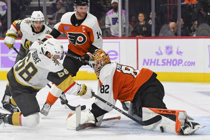 Nov 25, 2024; Philadelphia, Pennsylvania, USA; Philadelphia Flyers goaltender Ivan Fedotov (82) makes a save against Vegas Golden Knights center Callahan Burke (68) during the second period at Wells Fargo Center. Mandatory Credit: Eric Hartline-Imagn Images