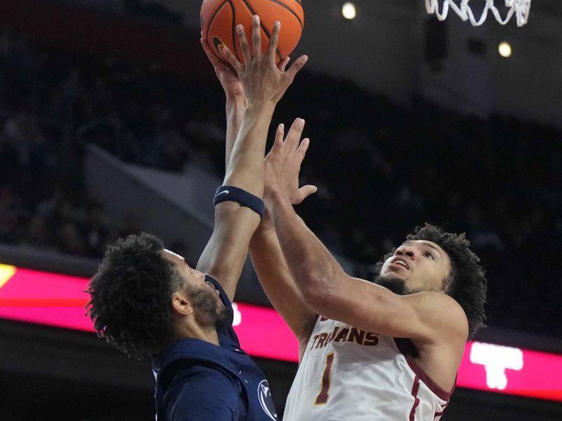 Feb 11, 2025; Los Angeles, California, USA; Southern California Trojans guard Desmond Claude (1) shoots the ball against Penn State Nittany Lions forward Zach Hicks (24) in the second half at Galen Center. Mandatory Credit: Kirby Lee-Imagn Images