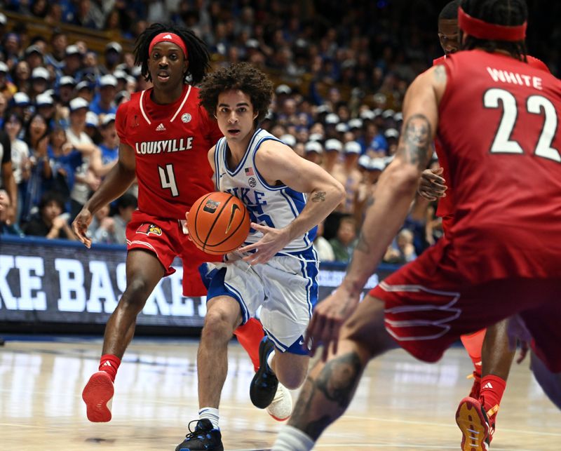 Feb 28, 2024; Durham, North Carolina, USA; Dulke Blue Devils guard Spencer Hubbard (55) drives to the basket past Louisville Cardinals guard Ty-Laur Johnson (4) during the second half at Cameron Indoor Stadium. The Blue Devils won 84-59.  Mandatory Credit: Rob Kinnan-USA TODAY Sports