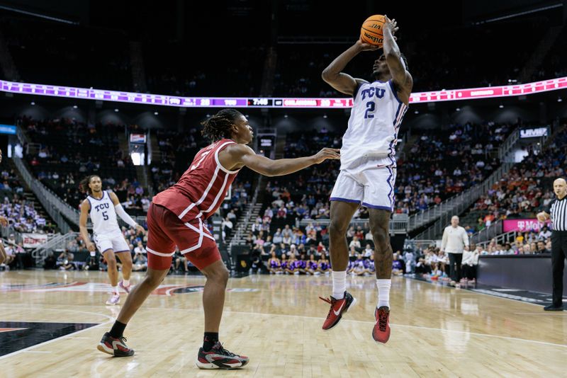 Mar 13, 2024; Kansas City, MO, USA; TCU Horned Frogs forward Emanuel Miller (2) shoots the ball over TCU Horned Frogs guard Avery Anderson III (3) during the first half at T-Mobile Center. Mandatory Credit: William Purnell-USA TODAY Sports