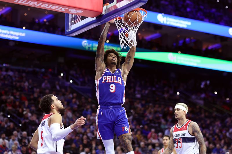 PHILADELPHIA, PENNSYLVANIA - DECEMBER 11: Kelly Oubre Jr. #9 of the Philadelphia 76ers dunks during the third quarter against the Washington Wizards at the Wells Fargo Center on December 11, 2023 in Philadelphia, Pennsylvania. (Photo by Tim Nwachukwu/Getty Images)