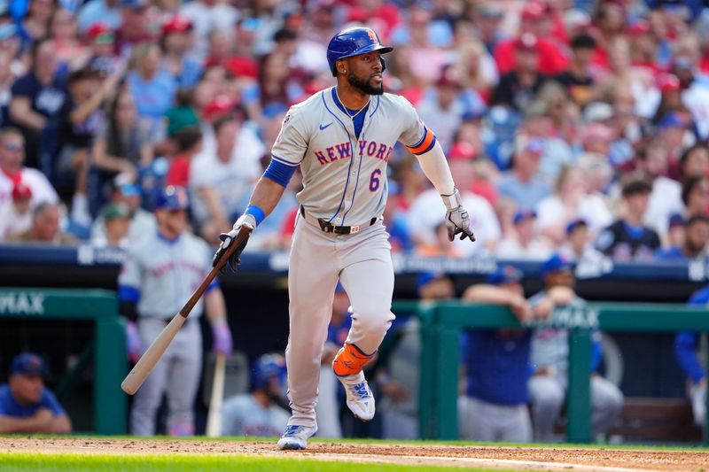 Sep 14, 2024; Philadelphia, Pennsylvania, USA; New York Mets right fielder Starling Marte (6) watches his RBI triple against the Philadelphia Phillies during the third inning at Citizens Bank Park. Mandatory Credit: Gregory Fisher-Imagn Images