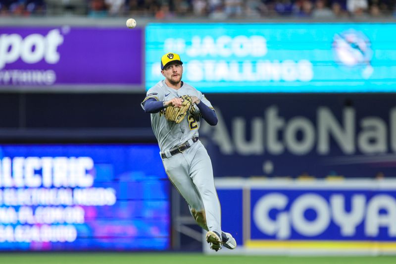 Sep 22, 2023; Miami, Florida, USA; Milwaukee Brewers second baseman Brice Turang (2) throws to first base and retires Miami Marlins shortstop Joey Wendle (not pictured) during the eighth inning at loanDepot Park. Mandatory Credit: Sam Navarro-USA TODAY Sports