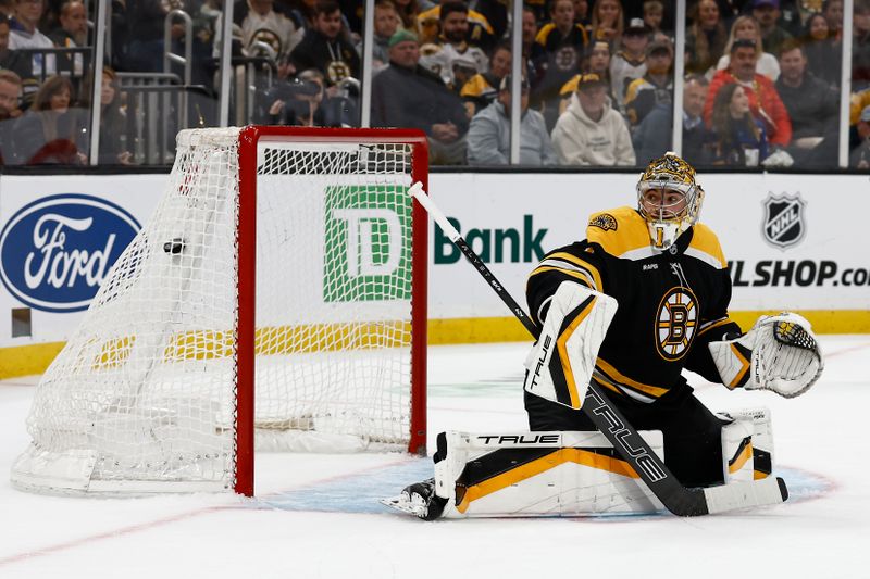 Oct 14, 2024; Boston, Massachusetts, USA; A shot by Florida Panthers center Sam Reinhart (13) gets past Boston Bruins goaltender Jeremy Swayman (1) for a goal during the first period at TD Garden. Mandatory Credit: Winslow Townson-Imagn Images