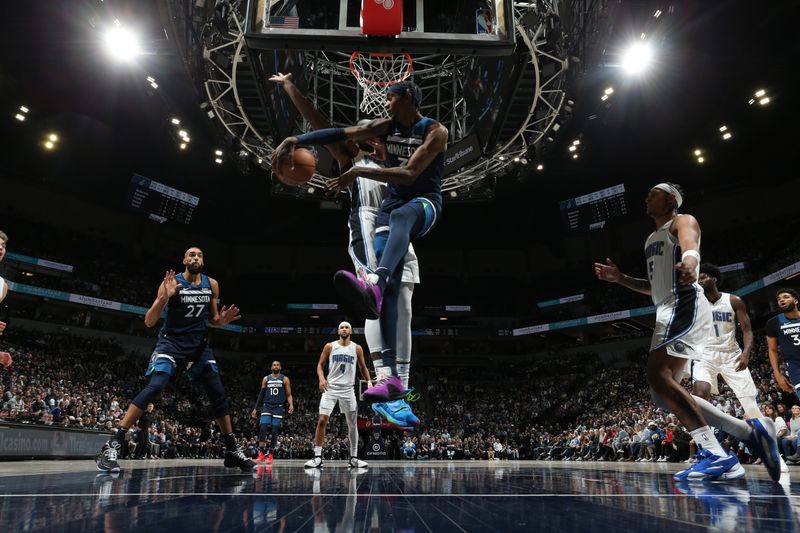 MINNEAPOLIS, MN -  FEBRUARY 2: Jaden McDaniels #3 of the Minnesota Timberwolves passes the ball during the game against the Orlando Magic on February 2, 2024 at Target Center in Minneapolis, Minnesota. NOTE TO USER: User expressly acknowledges and agrees that, by downloading and or using this Photograph, user is consenting to the terms and conditions of the Getty Images License Agreement. Mandatory Copyright Notice: Copyright 2024 NBAE (Photo by David Sherman/NBAE via Getty Images)