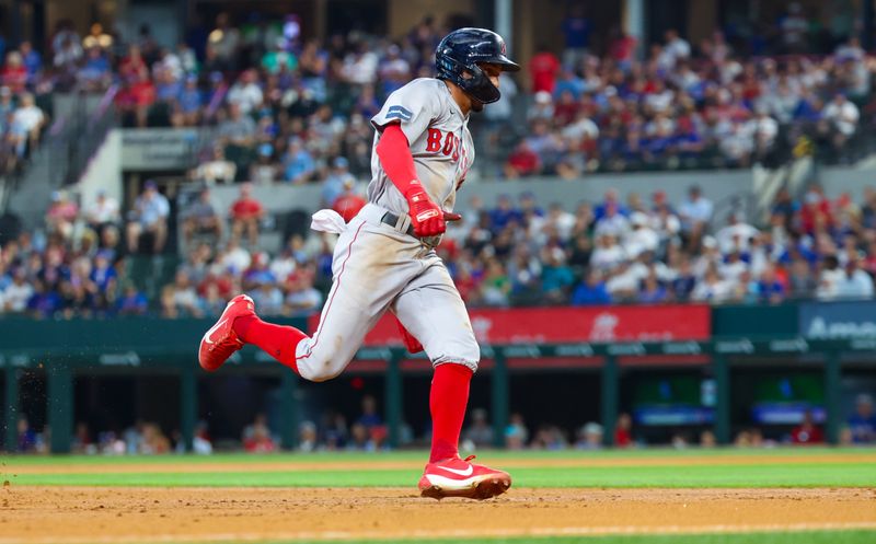 Aug 4, 2024; Arlington, Texas, USA; Boston Red Sox second baseman David Hamilton (70) rounds third base and scores during the third inning against the Texas Rangers at Globe Life Field. Mandatory Credit: Kevin Jairaj-USA TODAY Sports