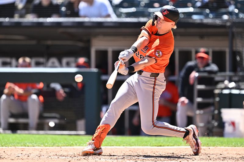 May 25, 2024; Chicago, Illinois, USA;  Baltimore Orioles outfielder Kyle Stowers (28) hits a single in the fifth inning against the Chicago White Sox at Guaranteed Rate Field. Mandatory Credit: Jamie Sabau-USA TODAY Sports