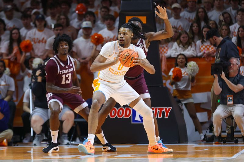 Feb 24, 2024; Knoxville, Tennessee, USA; Tennessee Volunteers forward Jonas Aidoo (0) looks to moves the ball against the Texas A&M Aggies during the first half at Thompson-Boling Arena at Food City Center. Mandatory Credit: Randy Sartin-USA TODAY Sports