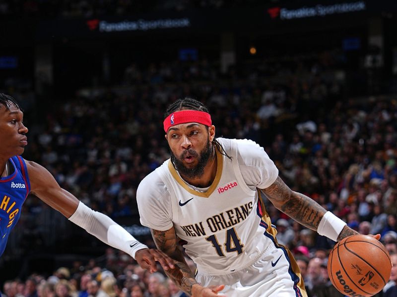 DENVER, CO - JANUARY 12: Brandon Ingram #14 of the New Orleans Pelicans drives to the basket during the game against the Denver Nuggets on January 12, 2024 at the Ball Arena in Denver, Colorado. NOTE TO USER: User expressly acknowledges and agrees that, by downloading and/or using this Photograph, user is consenting to the terms and conditions of the Getty Images License Agreement. Mandatory Copyright Notice: Copyright 2024 NBAE (Photo by Garrett Ellwood/NBAE via Getty Images)