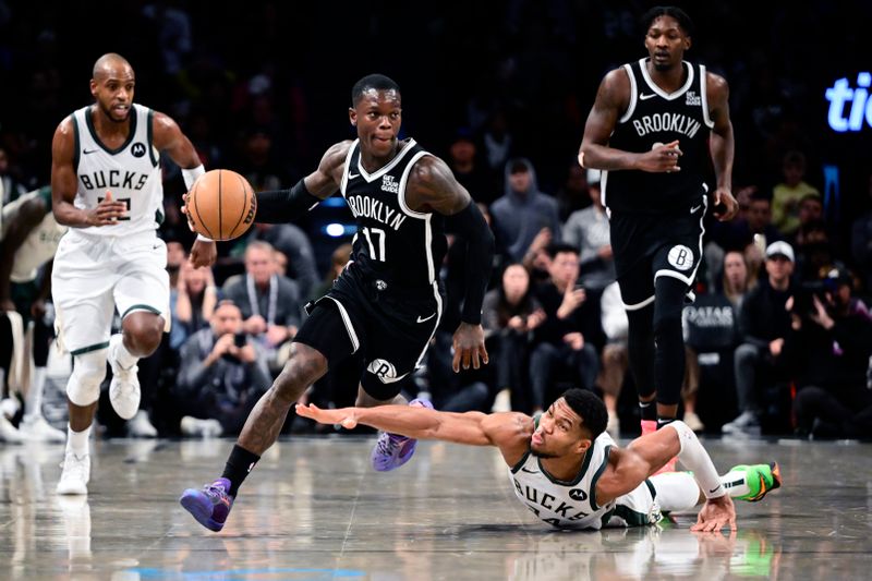 NEW YORK, NEW YORK - DECEMBER 08: Dennis Schroder #17 of the Brooklyn Nets is defended by Giannis Antetokounmpo #34 of the Milwaukee Bucks \d2h at Barclays Center on December 08, 2024 in New York City. NOTE TO USER: User expressly acknowledges and agrees that, by downloading and or using this Photograph, user is consenting to the terms and conditions of the Getty Images License Agreement. (Photo by Steven Ryan/Getty Images)