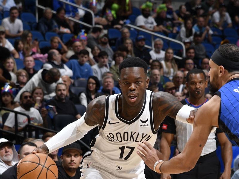 ORLANDO, FL - FEBRUARY 27: Dennis Schroder #17 of the Brooklyn Nets dribbles the ball during the game against the Orlando Magic on February 27, 2024 at the Kia Center in Orlando, Florida. NOTE TO USER: User expressly acknowledges and agrees that, by downloading and or using this photograph, User is consenting to the terms and conditions of the Getty Images License Agreement. Mandatory Copyright Notice: Copyright 2024 NBAE (Photo by Fernando Medina/NBAE via Getty Images)