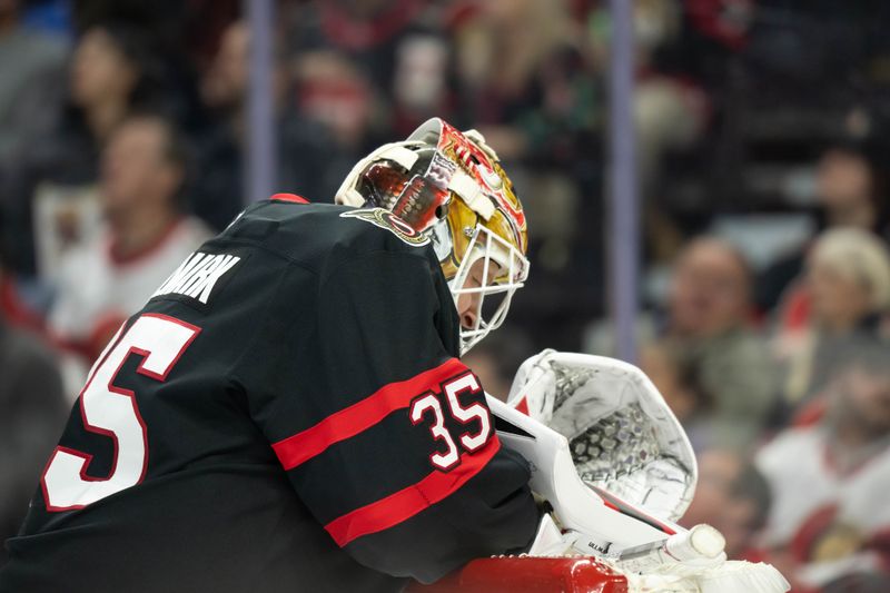 Dec 5, 2024; Ottawa, Ontario, CAN;  Ottawa Senators goalie Linus Ullmark (35) takes a moment to relax during a break in the second period against the Detroit Red Wings at the Canadian Tire Centre. Mandatory Credit: Marc DesRosiers-Imagn Images