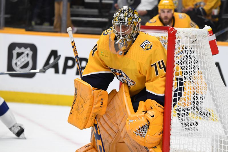 Sep 27, 2023; Nashville, Tennessee, USA; Nashville Predators goaltender Juuse Saros (74) follows the puck during the second period against the Tampa Bay Lightning at Bridgestone Arena. Mandatory Credit: Christopher Hanewinckel-USA TODAY Sports