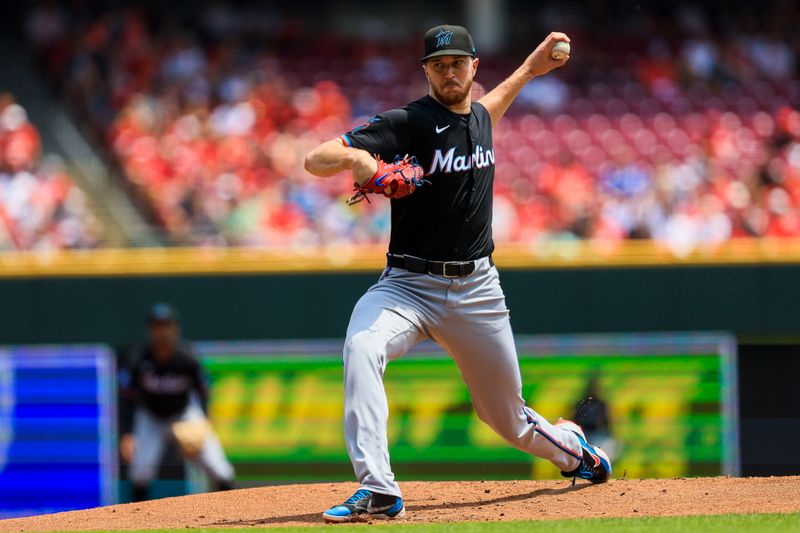 Jul 14, 2024; Cincinnati, Ohio, USA; Miami Marlins starting pitcher Trevor Rogers (28) pitches against the Cincinnati Reds in the first inning at Great American Ball Park. Mandatory Credit: Katie Stratman-USA TODAY Sports