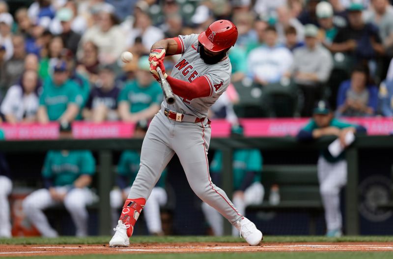 Jun 1, 2024; Seattle, Washington, USA;  Los Angeles Angels second baseman Luis Rengifo (2) hits a single against the Los Angeles Angels during the first inning at T-Mobile Park. Mandatory Credit: John Froschauer-USA TODAY Sports