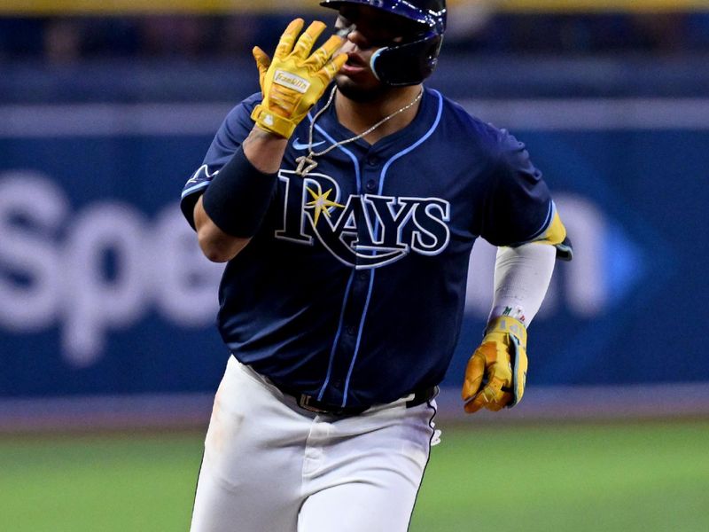 Apr 23, 2024; St. Petersburg, Florida, USA; Tampa Bay Rays third baseman Isaac Paredes (17) celebrates after hitting a two-run home run in the sixth inning against the Detroit Tigers at Tropicana Field. Mandatory Credit: Jonathan Dyer-USA TODAY Sports