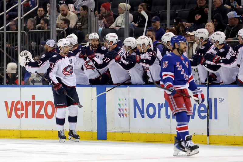 Mar 2, 2026; New York, New York, USA; Columbus Blue Jackets center Sean Monahan (23) celebrates his goal against the New York Rangers with teammates during the second period at Madison Square Garden. Mandatory Credit: Brad Penner-Imagn Images