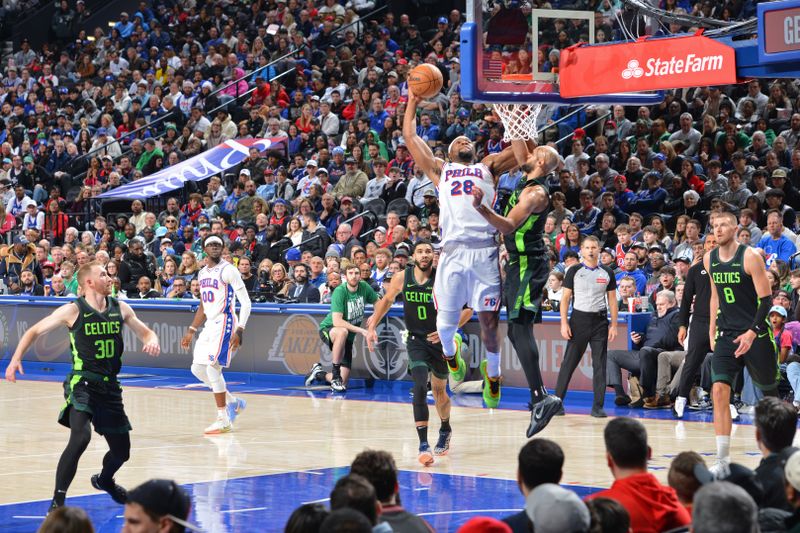 PHILADELPHIA, PA - FEBRUARY 2: Guerschon Yabusele #28 of the Philadelphia 76ers dunks the ball during the game against the Boston Celtics on February 2, 2025 at the Wells Fargo Center in Philadelphia, Pennsylvania NOTE TO USER: User expressly acknowledges and agrees that, by downloading and/or using this Photograph, user is consenting to the terms and conditions of the Getty Images License Agreement. Mandatory Copyright Notice: Copyright 2025 NBAE(Photo by Jesse D. Garrabrant/NBAE via Getty Images)