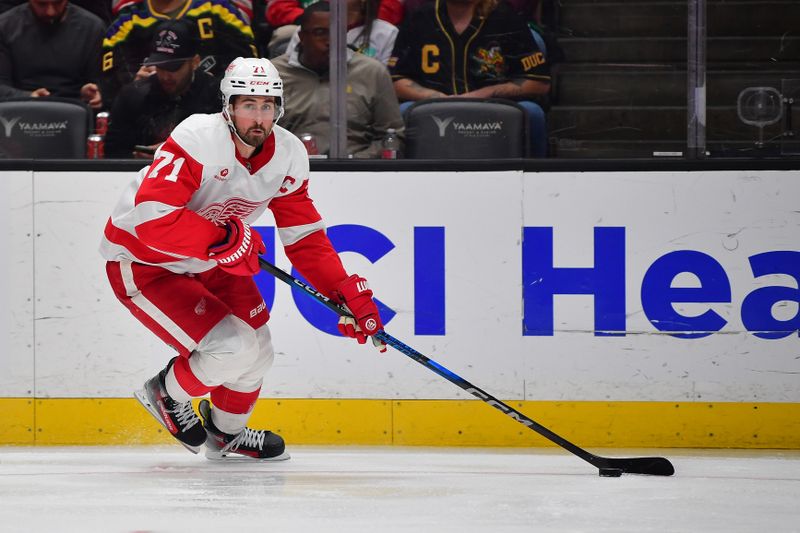 Nov 15, 2024; Anaheim, California, USA; Detroit Red Wings center Dylan Larkin (71) moves to the puck against the Anaheim Ducks during the third period at Honda Center. Mandatory Credit: Gary A. Vasquez-Imagn Images