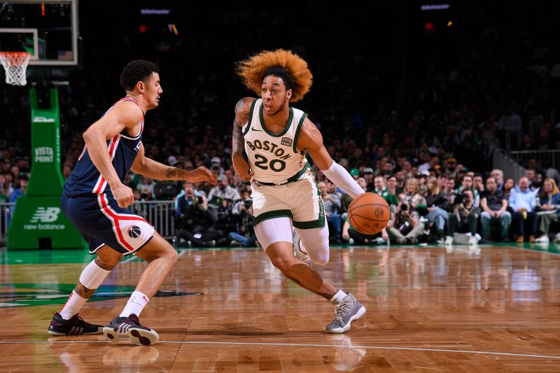 BOSTON, MA - APRIL 14: JD Davison #20 of the Boston Celtics drives to the basket during the game  against the Washington Wizards on April 14, 2024 at the TD Garden in Boston, Massachusetts. NOTE TO USER: User expressly acknowledges and agrees that, by downloading and or using this photograph, User is consenting to the terms and conditions of the Getty Images License Agreement. Mandatory Copyright Notice: Copyright 2024 NBAE  (Photo by Brian Babineau/NBAE via Getty Images)