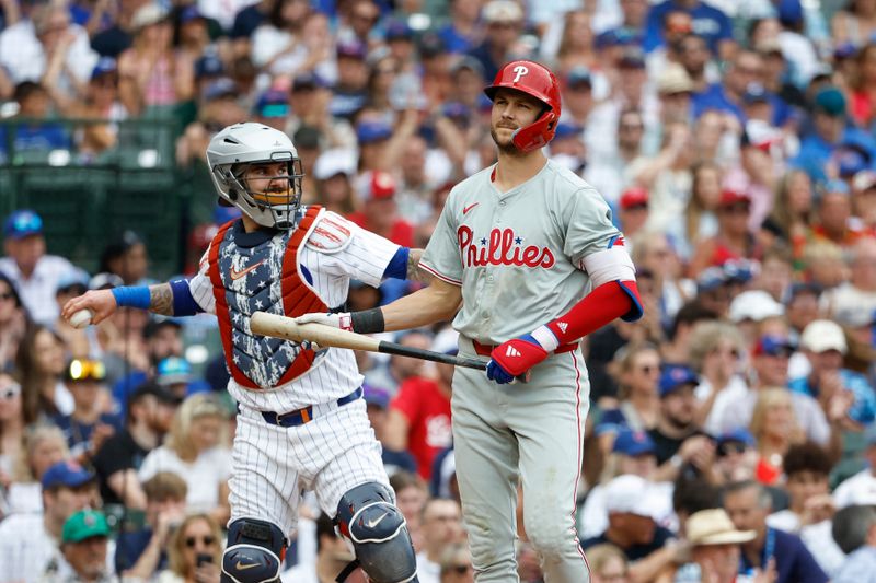 Jul 4, 2024; Chicago, Illinois, USA; Philadelphia Phillies shortstop Trea Turner (7) reacts after striking out against the Chicago Cubs during the eighth inning at Wrigley Field. Mandatory Credit: Kamil Krzaczynski-USA TODAY Sports