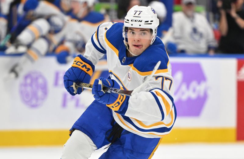 Nov 4, 2023; Toronto, Ontario, CAN;  Buffalo Sabres forward JJ Peterka (77) pursues the play against the Toronto Maple Leafs in the third period at Scotiabank Arena. Mandatory Credit: Dan Hamilton-USA TODAY Sports