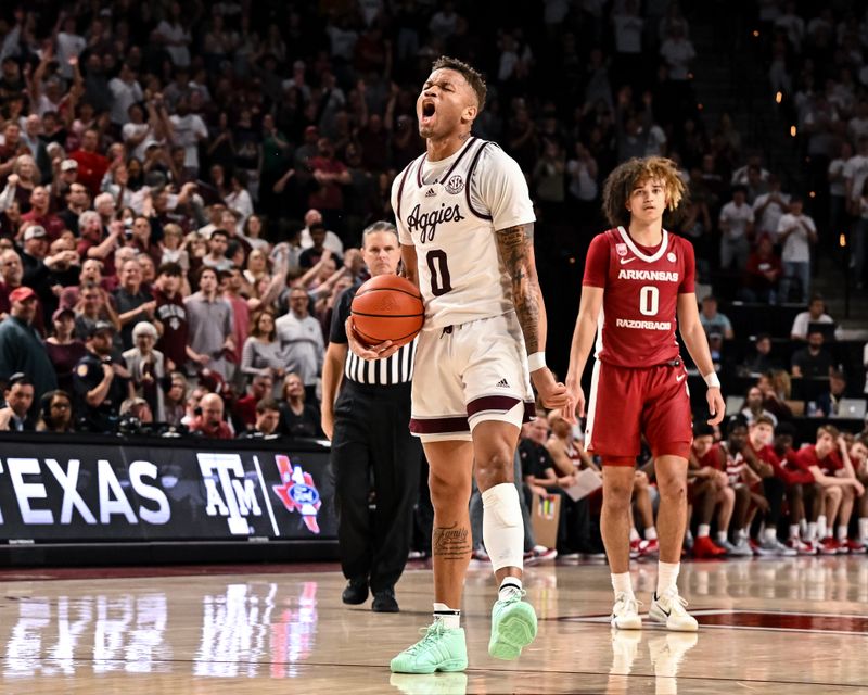 Feb 15, 2023; College Station, Texas, USA; Texas A&M Aggies guard Dexter Dennis (0) reacts during the second half against the Arkansas Razorbacks at Reed Arena. Mandatory Credit: Maria Lysaker-USA TODAY Sports