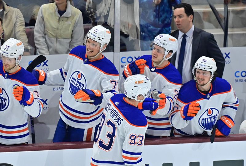 Mar 27, 2023; Tempe, Arizona, USA;  Edmonton Oilers center Ryan Nugent-Hopkins (93) celebrats with teammates after scoring a goal in the third period against the Arizona Coyotes at Mullett Arena. Mandatory Credit: Matt Kartozian-USA TODAY Sports