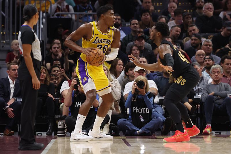 CLEVELAND, OH - OCTOBER 30:  Rui Hachimura #26 of the Los Angeles Lakers handles the ball during the game against the Cleveland Cavaliers on October 30, 2024 at Rocket Mortgage FieldHouse in Cleveland, Ohio. NOTE TO USER: User expressly acknowledges and agrees that, by downloading and/or using this Photograph, user is consenting to the terms and conditions of the Getty Images License Agreement. Mandatory Copyright Notice: Copyright 2024 NBAE (Photo by  Lauren Leigh Bacho/NBAE via Getty Images)