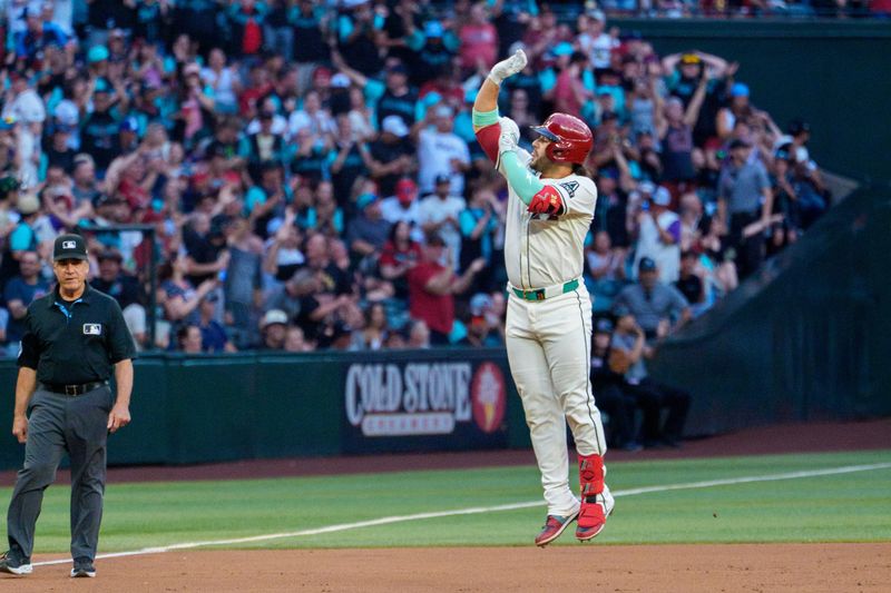 Apr 26, 2025; Phoenix, Arizona, USA;  Arizona Diamondbacks infielder Geraldo Perdomo (2) reacts after hitting his third home run of the game in the seventh inning against the Atlanta Braves at Chase Field. Mandatory Credit: Allan Henry-Imagn Images