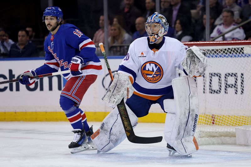 Mar 3, 2025; New York, New York, USA; New York Islanders goaltender Ilya Sorokin (30) tends net against New York Rangers center Vincent Trocheck (16) during the first period at Madison Square Garden. Mandatory Credit: Brad Penner-Imagn Images