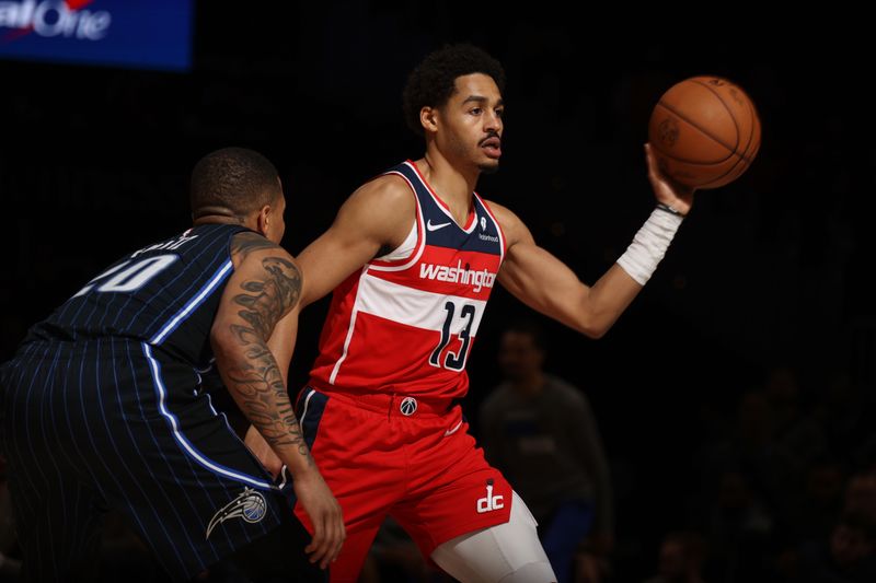 WASHINGTON, DC -? MARCH 6:  Jordan Poole #13 of the Washington Wizards passes the ball during the game on March 6, 2024 at Capital One Arena in Washington, DC. NOTE TO USER: User expressly acknowledges and agrees that, by downloading and or using this Photograph, user is consenting to the terms and conditions of the Getty Images License Agreement. Mandatory Copyright Notice: Copyright 2024 NBAE (Photo by Stephen Gosling/NBAE via Getty Images)