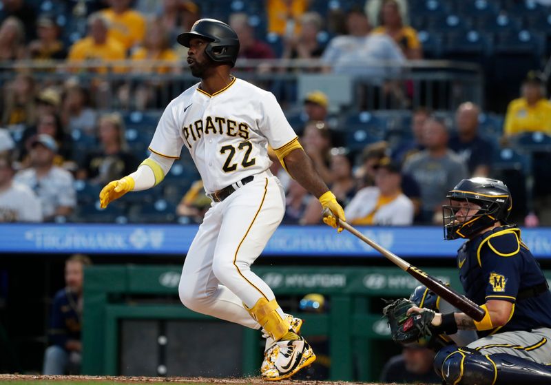 Sep 4, 2023; Pittsburgh, Pennsylvania, USA;  Pittsburgh Pirates designated hitter Andrew McCutchen (22) hits a double against the Milwaukee Brewers during the fourth inning at PNC Park. Mandatory Credit: Charles LeClaire-USA TODAY Sports