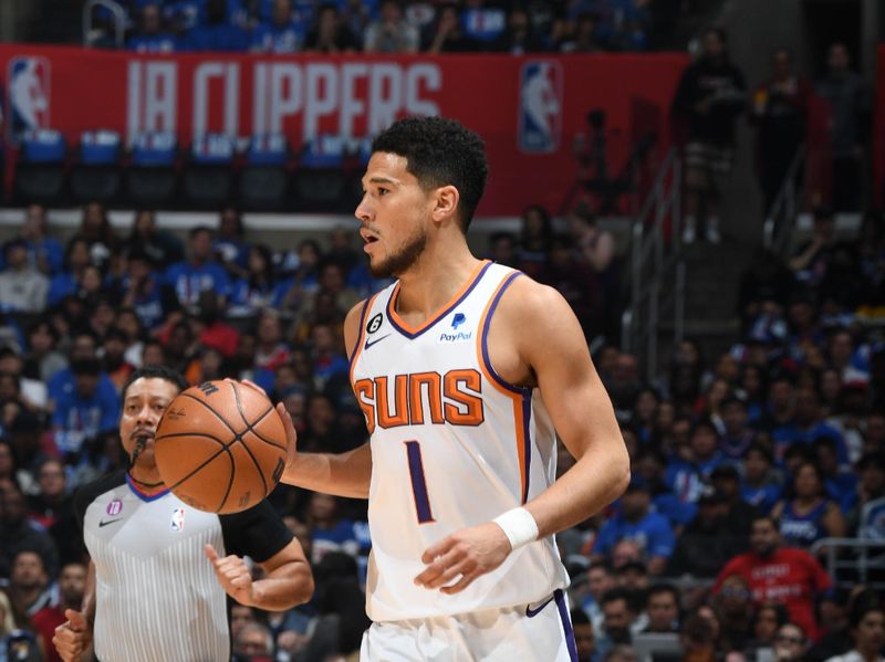 LOS ANGELES, CA - APRIL 20: Devin Booker #1 of the Phoenix Suns dribbles the ball during the game against the LA Clippers during Round 1 Game 3 of the 2023 NBA Playoffs on April 20, 2023 at Crypto.Com Arena in Los Angeles, California. NOTE TO USER: User expressly acknowledges and agrees that, by downloading and/or using this Photograph, user is consenting to the terms and conditions of the Getty Images License Agreement. Mandatory Copyright Notice: Copyright 2023 NBAE (Photo by Andrew D. Bernstein/NBAE via Getty Images)